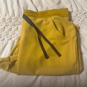 Figs light gold XL scrub woman scrub pants. To big. Woren once.